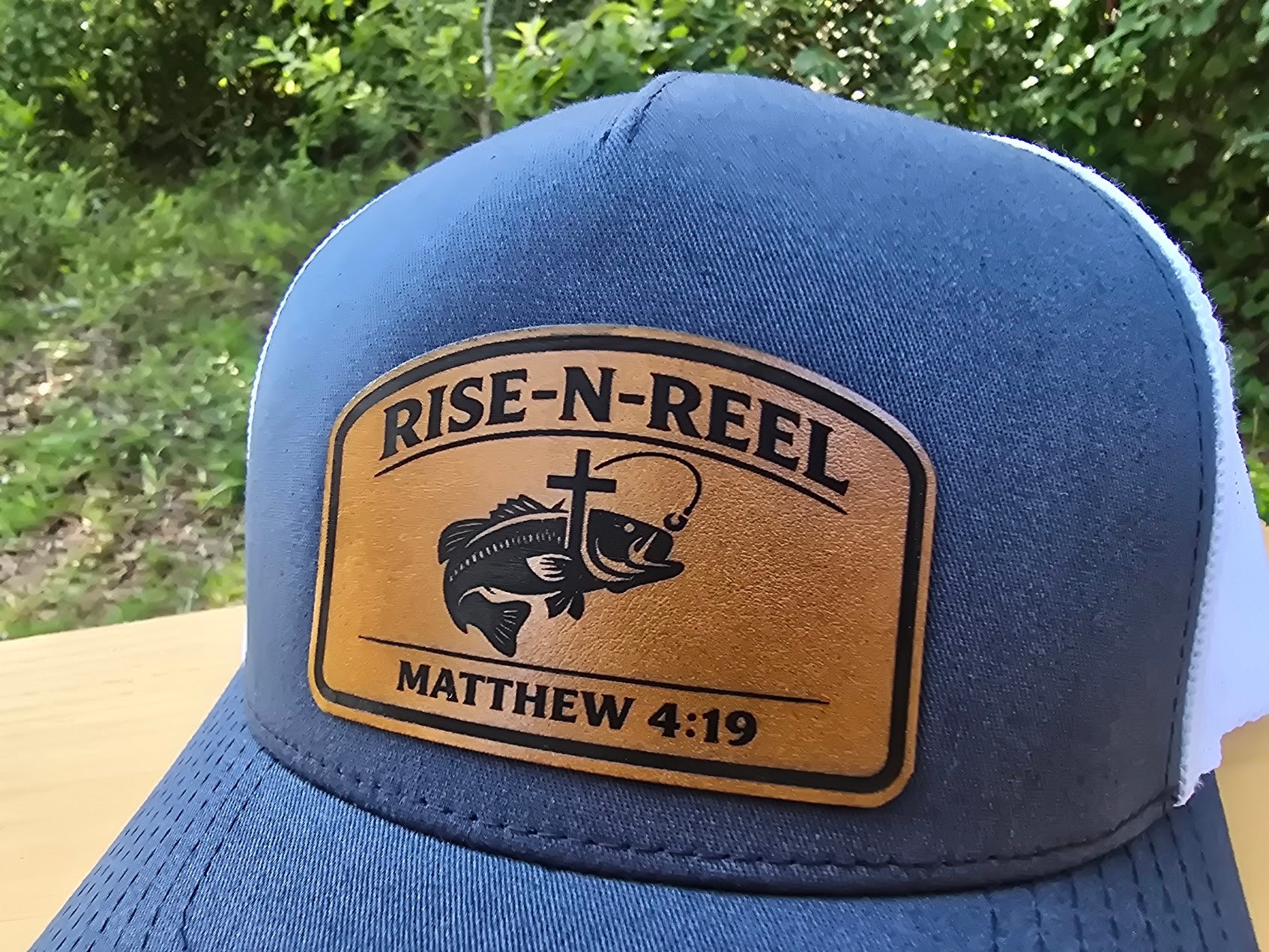 Rise-N-Reel Fishing Hat | Matthew 4:19 Leather Patch Yupoong Trucker