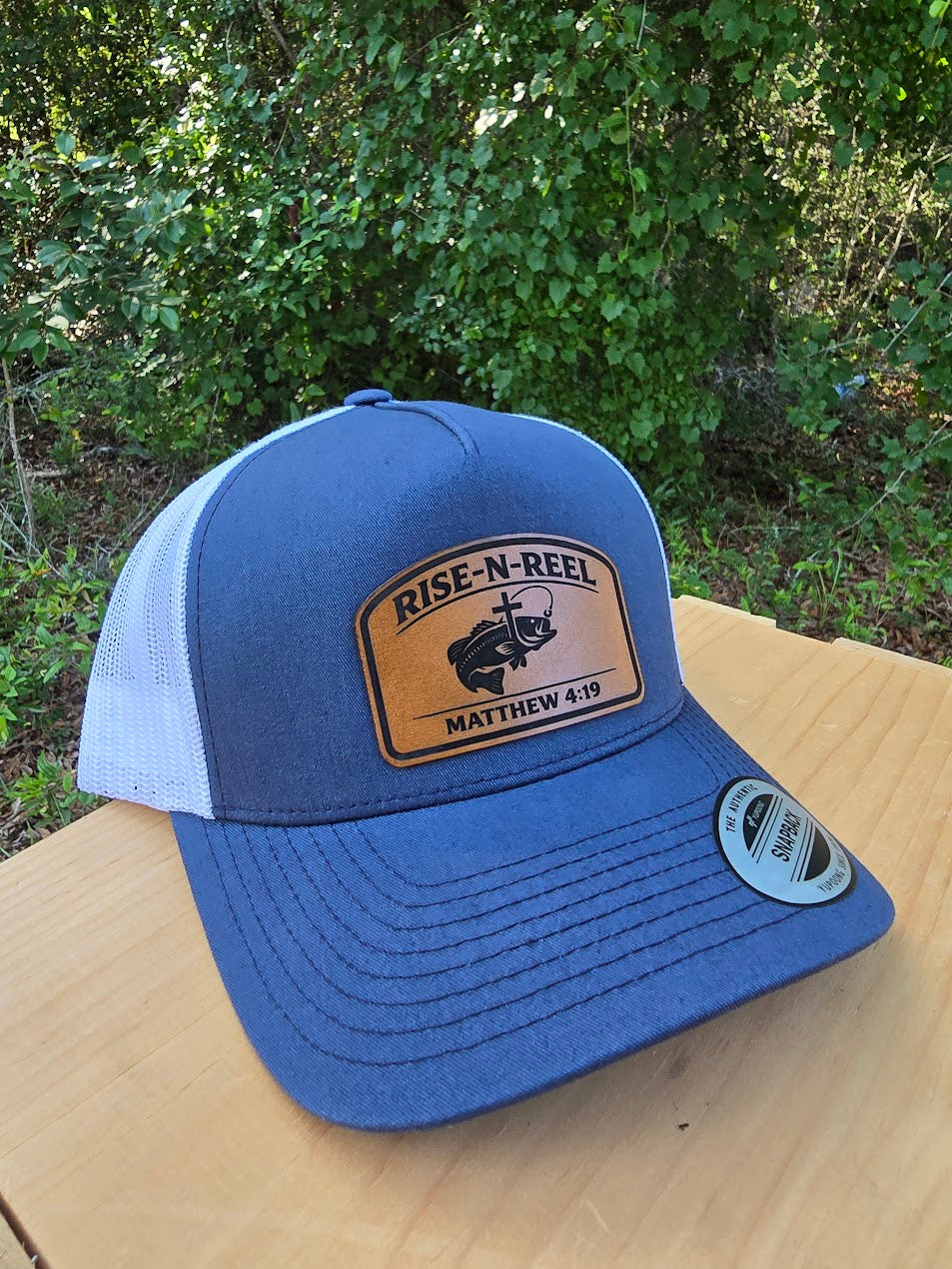 Rise-N-Reel Fishing Hat | Matthew 4:19 Leather Patch Yupoong Trucker